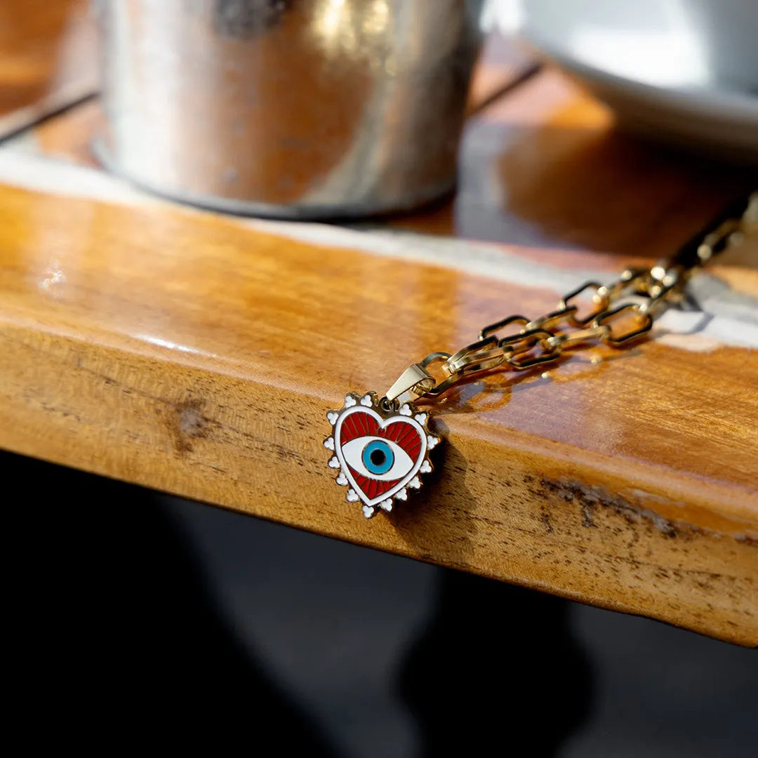 Gold coloured necklace with evil eye charm